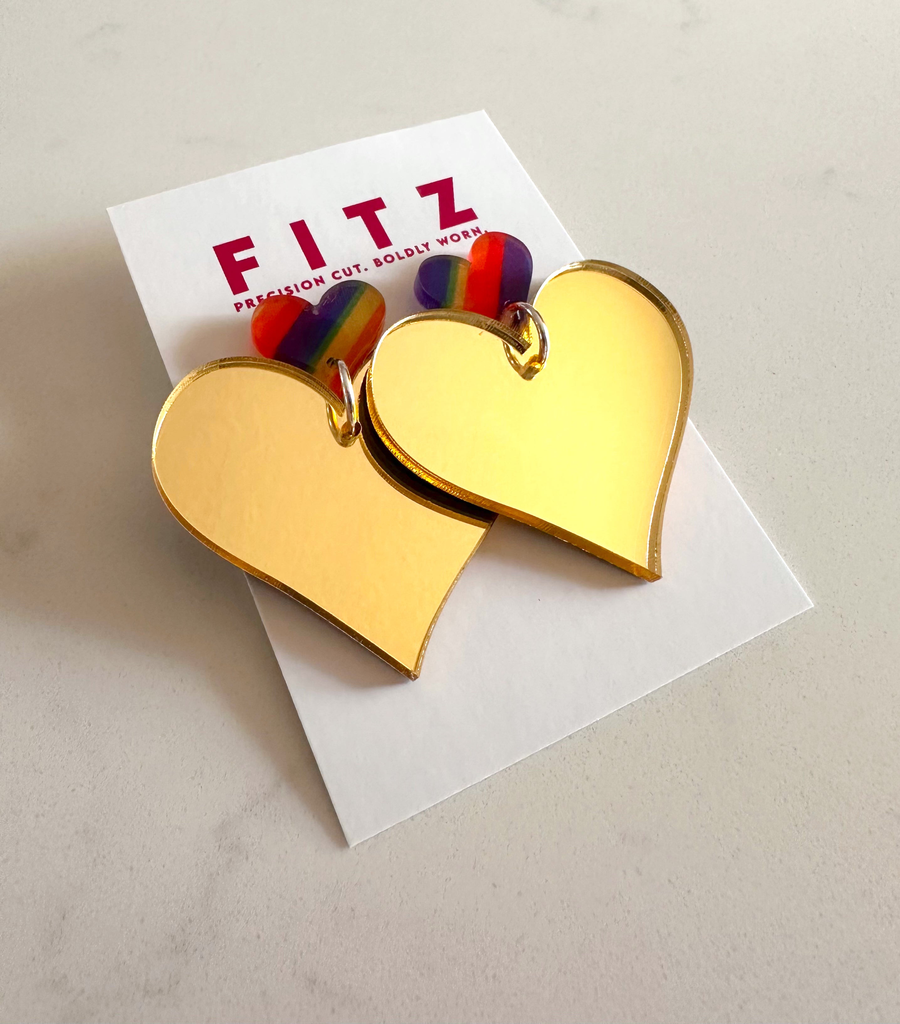 Gold hearts with rainbow studs