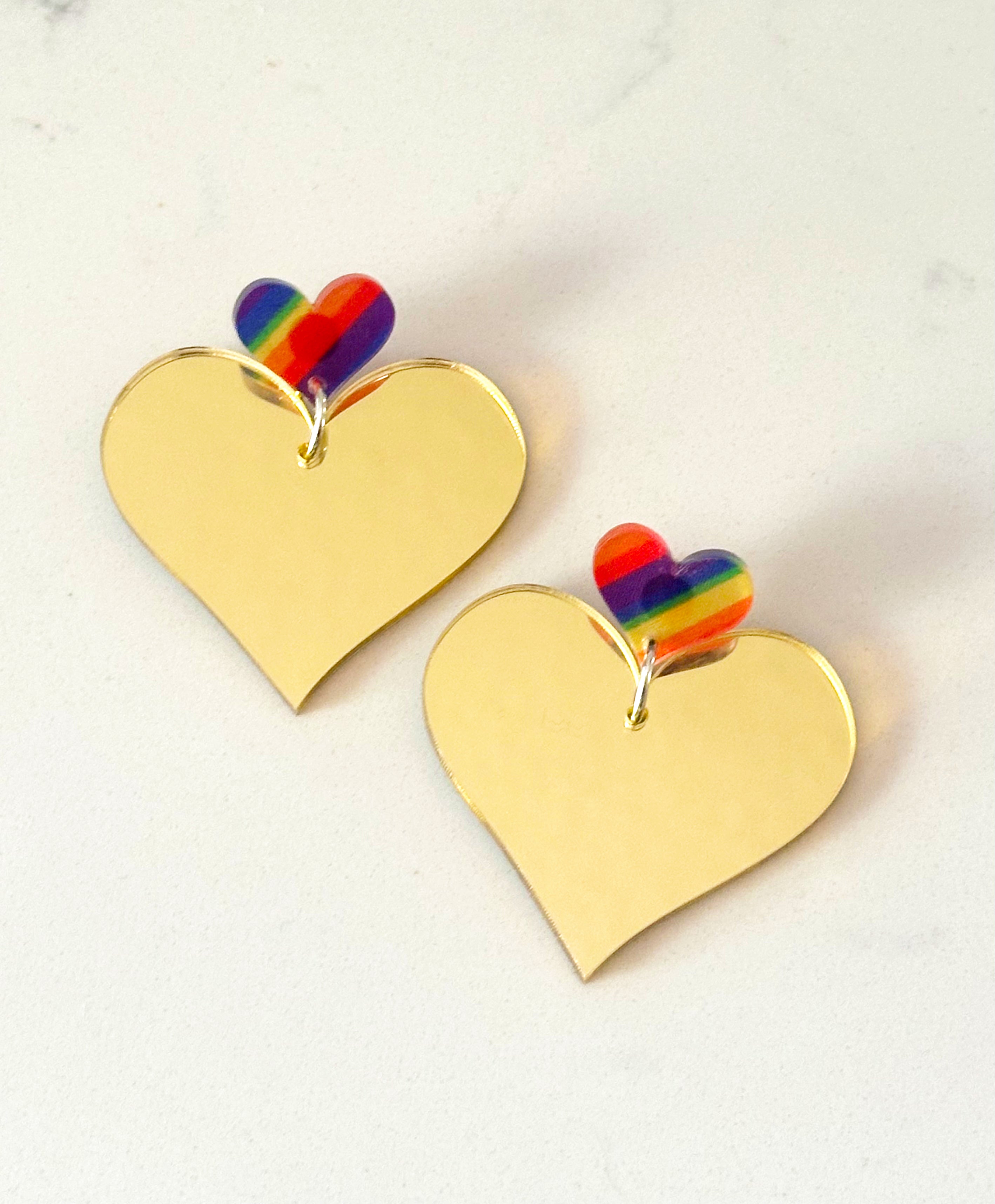 Gold hearts with rainbow studs